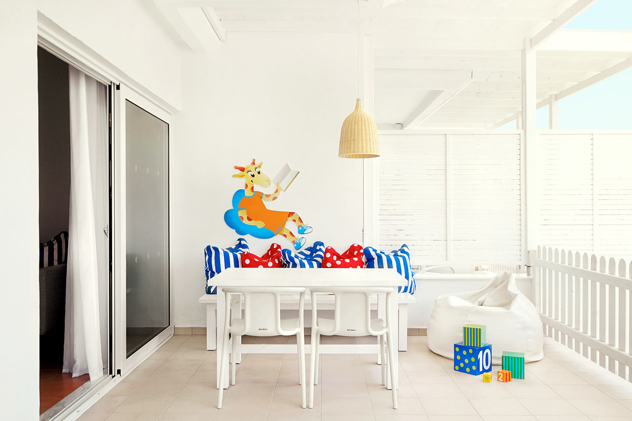 Den indhegnede terrasse i en Lollo & Bernie Suite mod haven